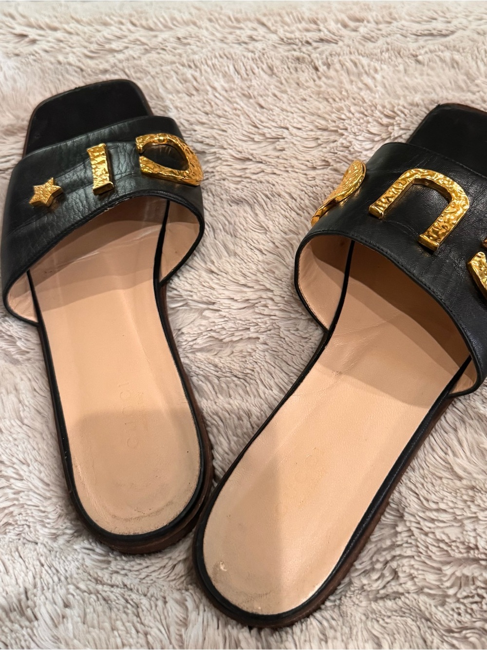 Gucci Black Leather Slide Mules with Gold Embellished Logo